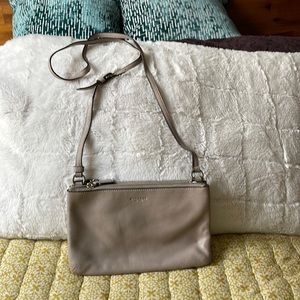 Leather Coach crossbody purse.